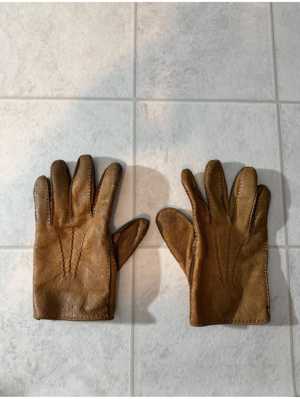 Brown leather gloves